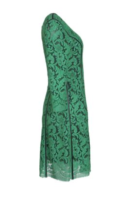 Dress, emerald bobinet lace with black contrast stitching